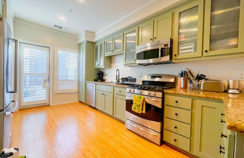 Prescott House | Elegant Trilevel Condo with 2 Master Suites & Cozy Patio
