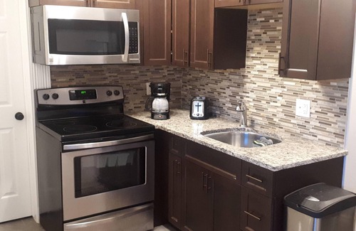 Timberlea Apartment | Stylish 2 Bedroom Suite with Heated Floors & Kitchen