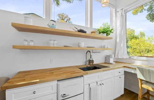 East MLK House | Extended Stay Haven: A+ Deck w/ Greenbelt Views!