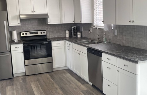 Roy House | Convenient Extended Stay Hotel near HAFB in Roy