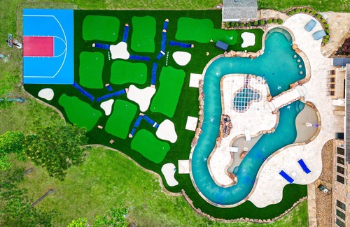 Spring House | Experience Your Personal Oasis with Pool & Mini Golf Fun