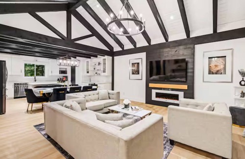 Swansea Point House | Extraordinary home with pool,hot tub, sauna, gym, arcade & theatre.
