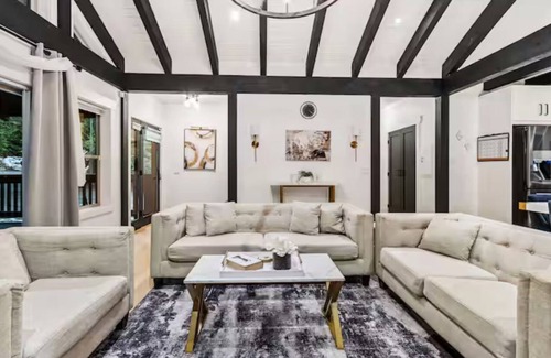 Swansea Point House | Extraordinary home with pool,hot tub, sauna, gym, arcade & theatre.