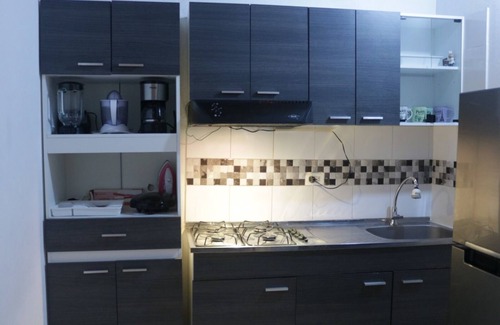 Robledo Apartment | Fántastico Apartment: Prime Location with Family-Friendly Amenities