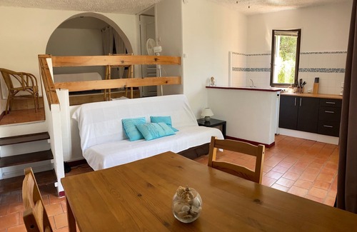 Patrimonio Apartment | F1 with Pool: Oceanfront Retreat Rated 10/10 by Guests