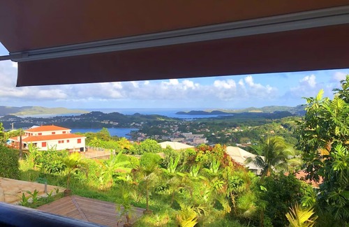 Tartane House | F3 Hibiscus: Ocean View, Pool & Family-Friendly Retreat