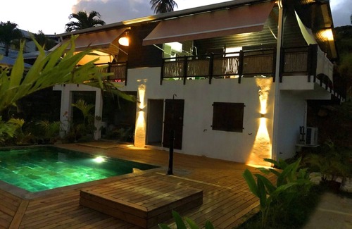 Tartane House | F3 Hibiscus: Ocean View, Pool & Family-Friendly Retreat