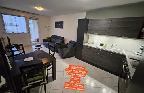 Hericourt Apartment | Inviting F3 RDC in City Center with Garage & Netflix