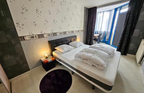 Hericourt Apartment | Inviting F3 RDC in City Center with Garage & Netflix