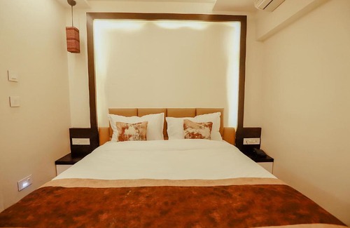 Maninagar Hotel | Guest Rated FabHotel Prime White Cloud with Breakfast & Fun