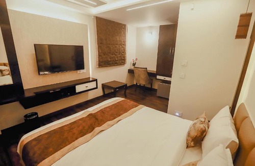 Maninagar Hotel | Guest Rated FabHotel Prime White Cloud with Breakfast & Fun