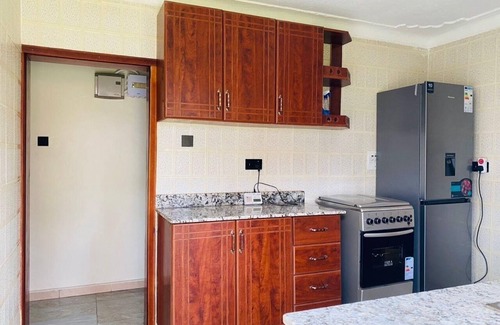 Central Kampala Apartment | Fabulous 2-BR/2BR, Fully furnished gated apartment. 1 mile fromThe Acacia Mall