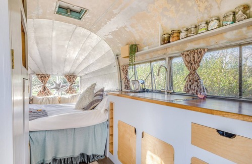 Hereford Cottage | Fabulous Airstream with sunken bath in the decking, perfect for that romantic break away.