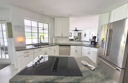 Astatula Villa | Fabulous lakefront villa 4 bedrooms with pool, spa, fitness room, ping-pong .