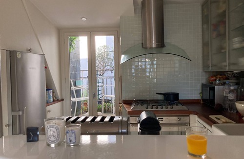 Notre-Dame-des-Champs Apartment | Elegant Penthouse with Scenic View in Saint Germain des Prés