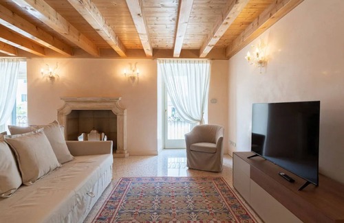 Citta Antica Apartment | Elegant Residence with Views of Piazza Erbe