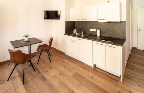 Nordhorn Apartment | FAIR BED 10 City Studio with kitchen, WLAN & PP