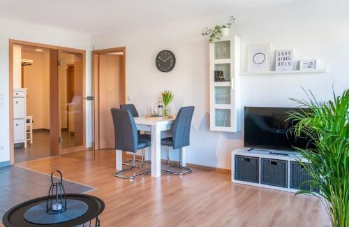 Huefingen Apartment | FAIRflats: Oceanfront Retreat with Balcony and Workspace