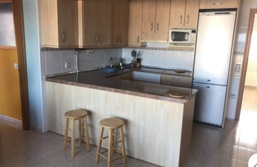 Llanca Apartment | Seaside Penthouse with Terrace and 9/10 Guest Rating