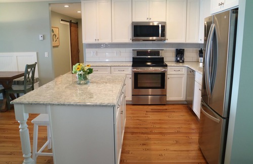 Suttons Bay Cottage | Private Waterfront Retreat with Kayaks and Bikes Available