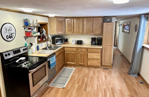 Northeast Michigan Cabin | Explore Lake Life: Kayaks, Fishing & Campfires Await!