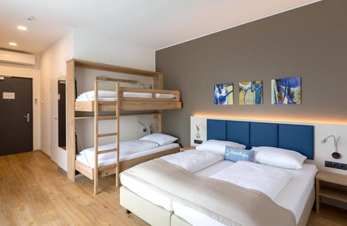 Rust Bed & Breakfast | Family Rooms with Pool & Ocean View at Hotel am See Rust