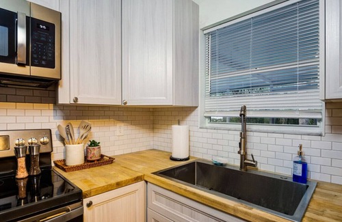 Palm Bay House | Families and large groups, with TVs in every room