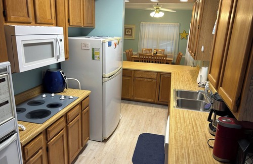Surfside Beach House | Unforgettable Beach Getaway: Family Fun Just Steps from Sand