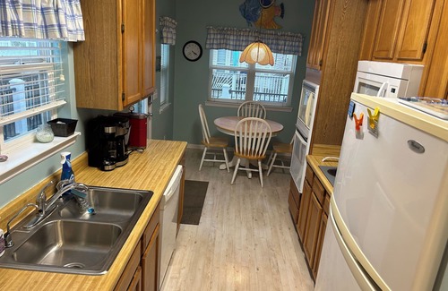Surfside Beach House | Unforgettable Beach Getaway: Family Fun Just Steps from Sand