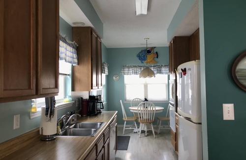 Surfside Beach House | Unforgettable Beach Getaway: Family Fun Just Steps from Sand