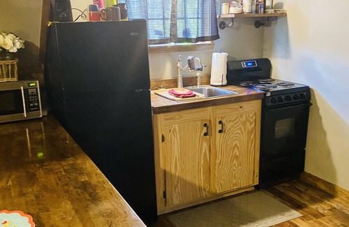 Perkinston Cabin | Family Cabin by the Creek with Pool & Ocean View!