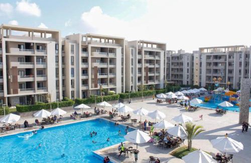 Borg el Arab Apartment | Family Chalet at Grand Hills Resort: Top-Rated Haven