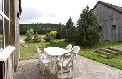 Saint-Denis-en-Margeride Ski Chalet | Cozy Family Chalet in Pine Forest at Les Bouviers