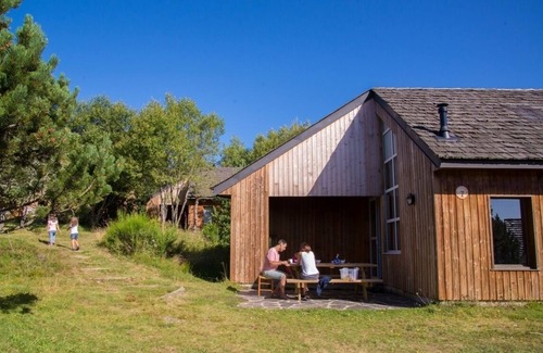 Saint-Denis-en-Margeride Ski Chalet | Cozy Family Chalet in Pine Forest at Les Bouviers