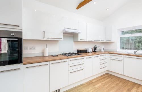 Eastcote House | Pet Friendly Family Home with Hot Tub in Pinner