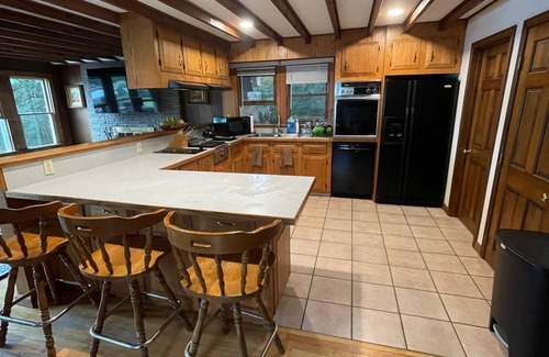 Meadows House | Perfect Retreat: Family-Friendly House with Game Room & Dock