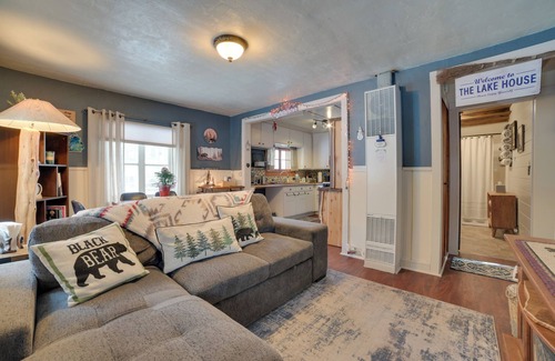 Prudenville Cabin | Family-Friendly Cabin with Lake Access and Spa Amenities