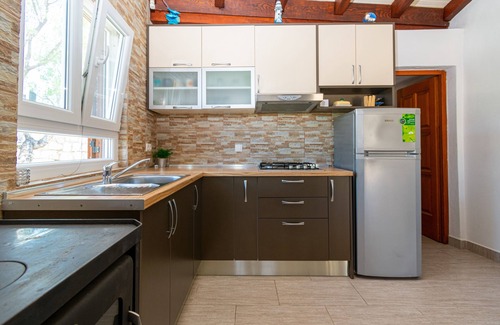 Tkon House | Family-Friendly Retreat with Pool in Cove Triluke, Pašman