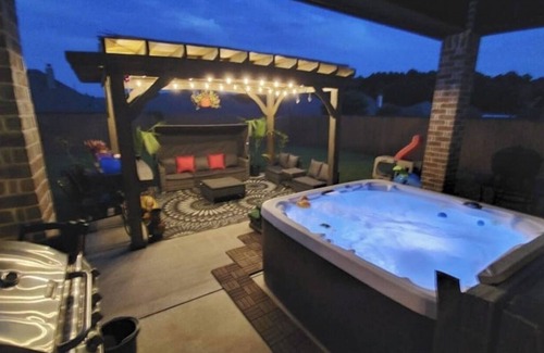 Tyler House | Family Fun 3BR Getaway with Hot Tub and Play Yard