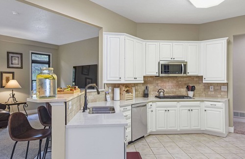 Battle Creek House | Experience Paradise Gardens: Game Room, Pool & Hot Tub!