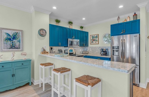 Indigo Reef Marina Homes House | Indigo Bliss: Updated Townhouse with Boat Dock & Pool