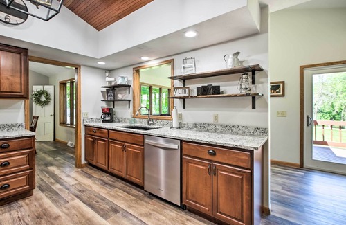 Janesville House | Inviting Family Retreat with Dock, Deck & Pool on River