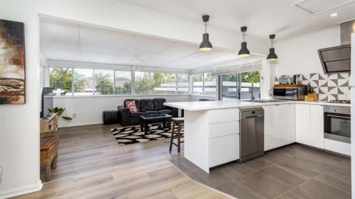 Banksia Beach House | Family Retreat with Pool & Guest House for Your Getaway