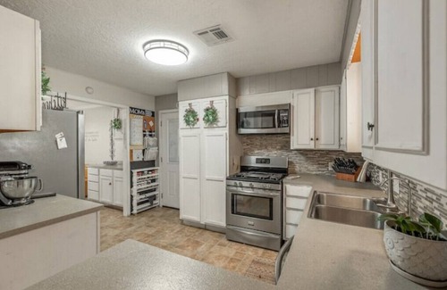 Bryan House | Family-Friendly Fun Space with Spa and Hot Tub Amenities