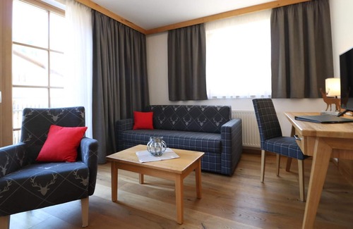 Rauris Cottage | Family room 2-room half board - Hotel Bräu***