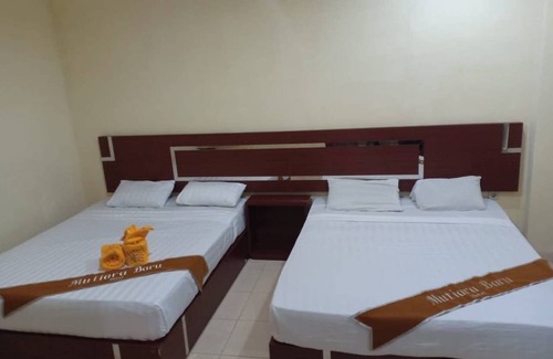 Sidomulyo House | Family Rooms for 4 at Mutiara Batu with Breakfast Included