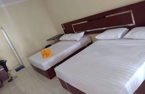 Sidomulyo House | Family Rooms for 4 at Mutiara Batu with Breakfast Included