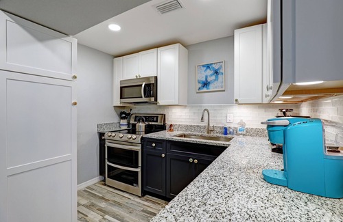 Mid Island House | Family-Friendly Retreat with Private Beach and Hot Tub