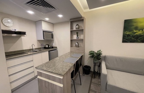 Heliopolis Apartment | Convenient Family Studio Twin Near Airport with Pool