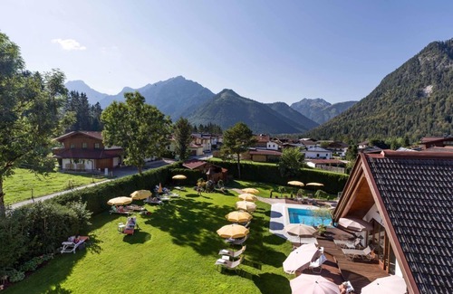 Pertisau House | Family Suite "Seeberg" at Hotel Karlwirt with Unique Amenities